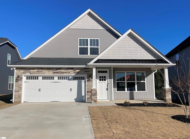 craftsman-style home featuring a garage and a porch