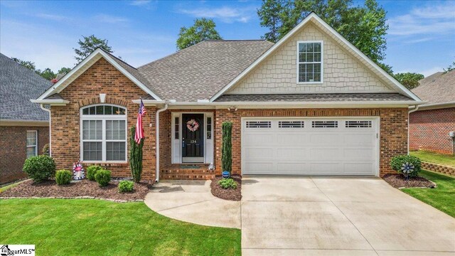 view of front of property with a front lawn