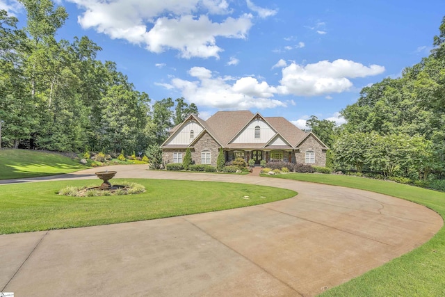 craftsman house featuring a front lawn