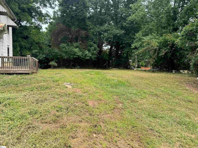 view of yard featuring a deck