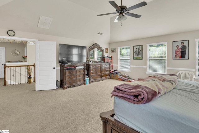 bedroom featuring carpet, lofted ceiling, and ceiling fan