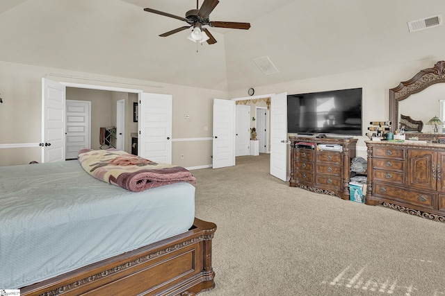 bedroom with light carpet, ceiling fan, and high vaulted ceiling