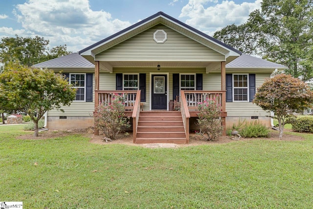 bungalow-style house with covered porch and a front lawn