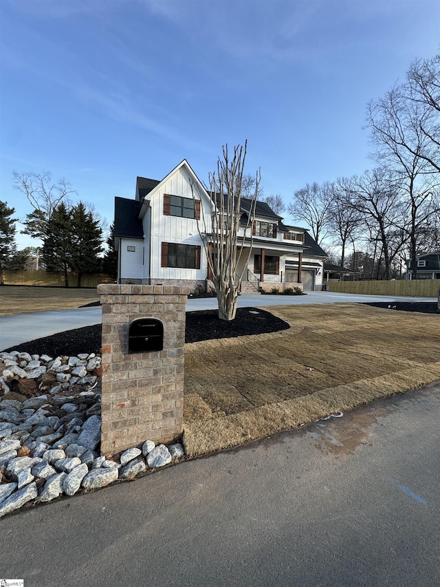 view of front of property featuring a garage