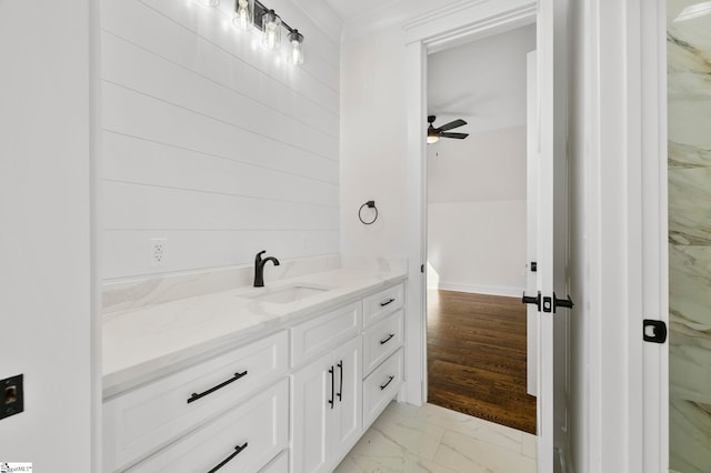 bathroom featuring vanity and ceiling fan