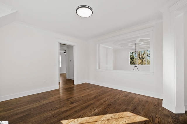 unfurnished room featuring crown molding and dark hardwood / wood-style flooring