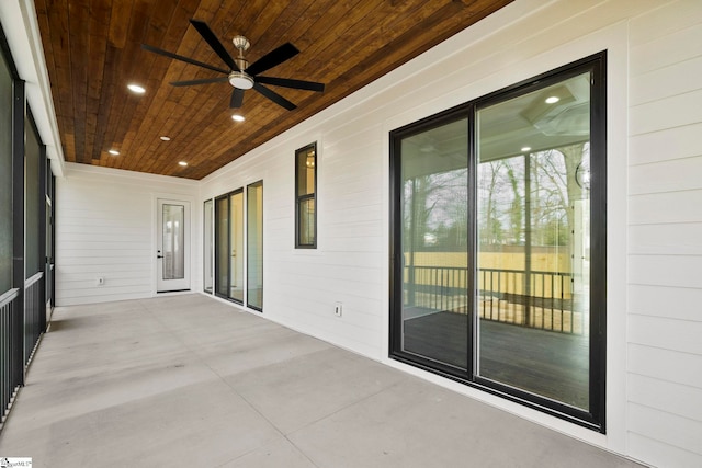 view of patio featuring ceiling fan