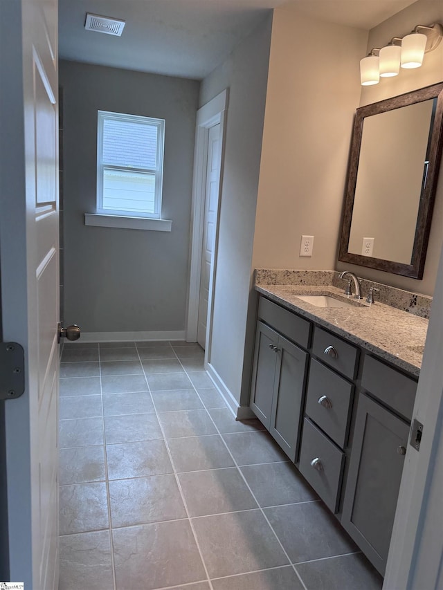 bathroom featuring vanity and tile patterned floors