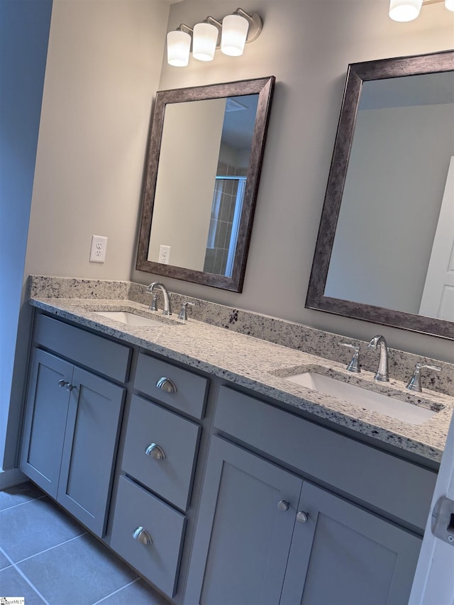 bathroom featuring tile patterned floors and vanity