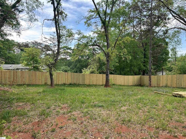 view of yard with fence