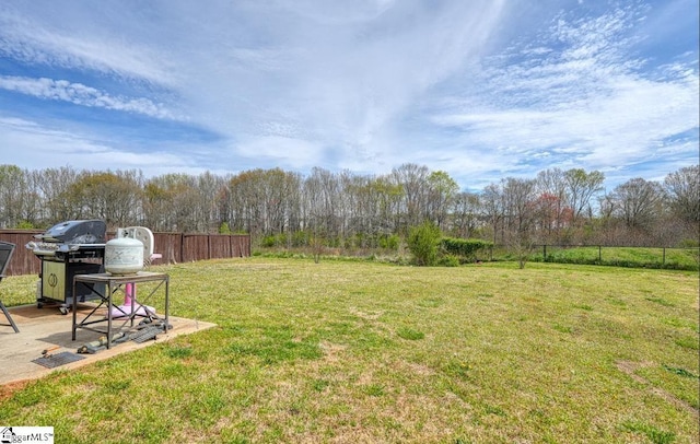 view of yard with fence