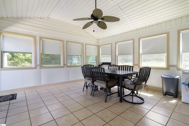 sunroom featuring lofted ceiling and ceiling fan