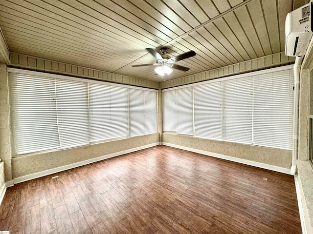 interior space featuring an AC wall unit, wooden ceiling, and ceiling fan