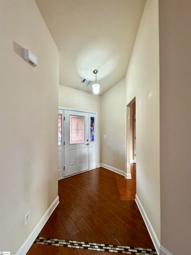 foyer with wood-type flooring