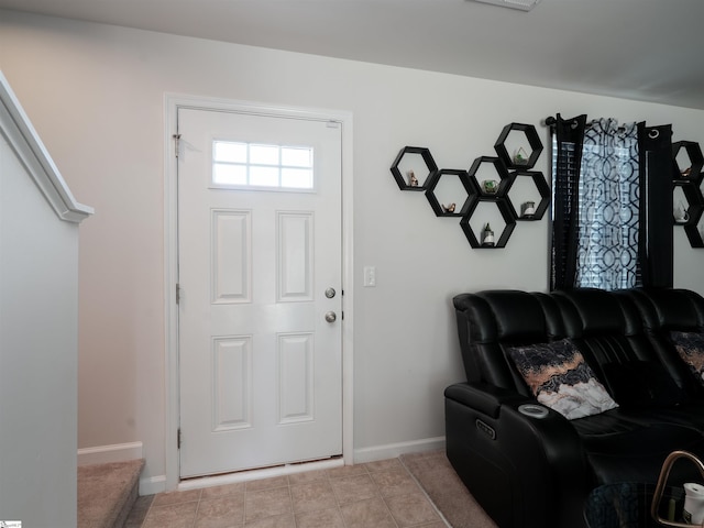 entryway featuring light tile patterned flooring