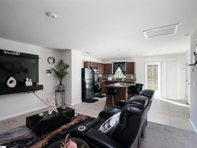 living room with light carpet