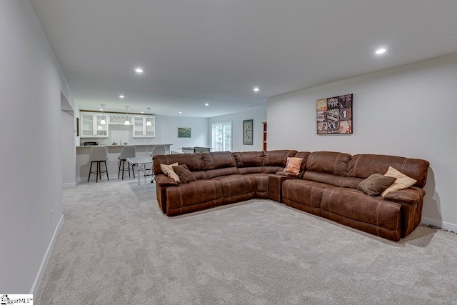 living room featuring light colored carpet