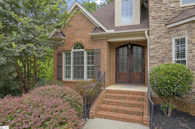 doorway to property featuring french doors