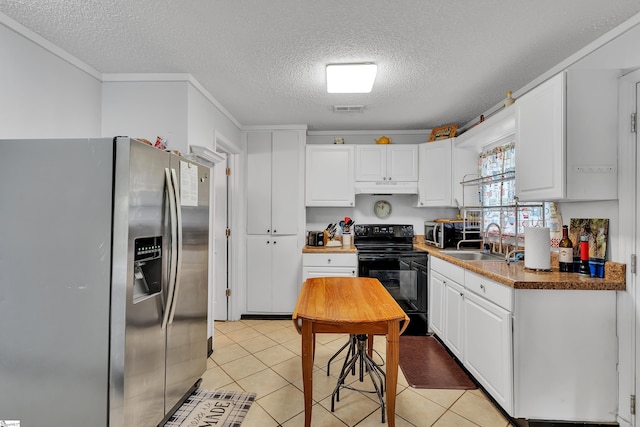 kitchen with stainless steel fridge with ice dispenser, light tile patterned floors, white cabinets, black / electric stove, and sink