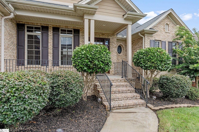 view of front of property featuring covered porch