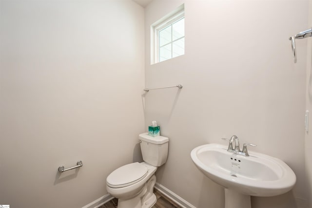 bathroom with toilet and sink