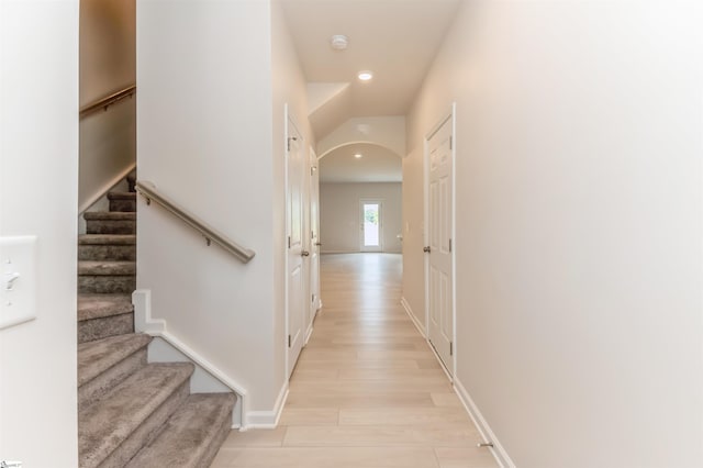 corridor featuring light wood-type flooring