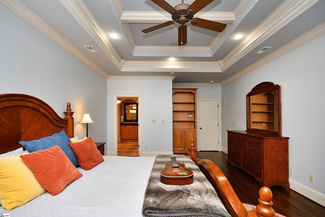 bedroom with ceiling fan, crown molding, a raised ceiling, and dark hardwood / wood-style floors