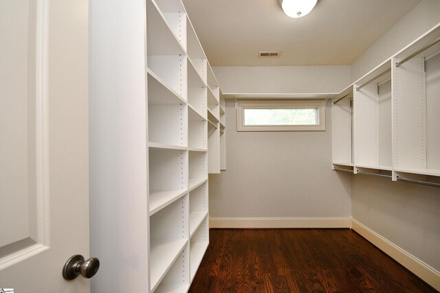 walk in closet featuring hardwood / wood-style floors