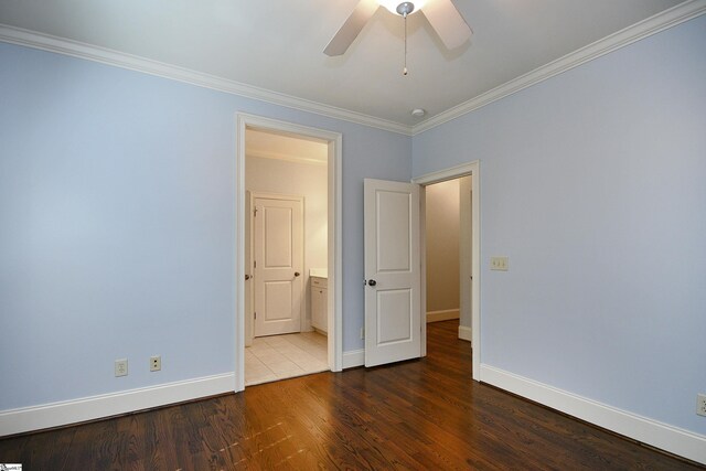 unfurnished room featuring ceiling fan, crown molding, and hardwood / wood-style flooring