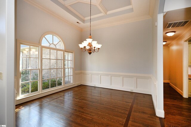 spare room featuring coffered ceiling, crown molding, a notable chandelier, and dark hardwood / wood-style floors