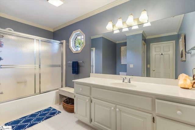 bathroom with vanity, ornamental molding, and enclosed tub / shower combo