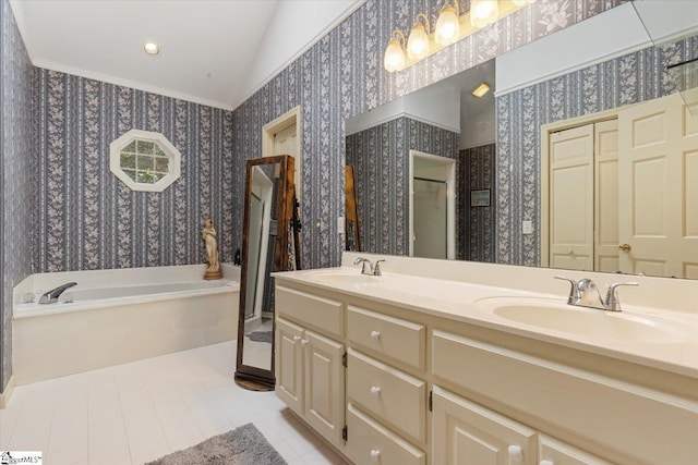 bathroom with shower with separate bathtub, vaulted ceiling, and vanity