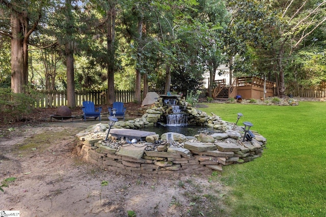 view of yard featuring a deck