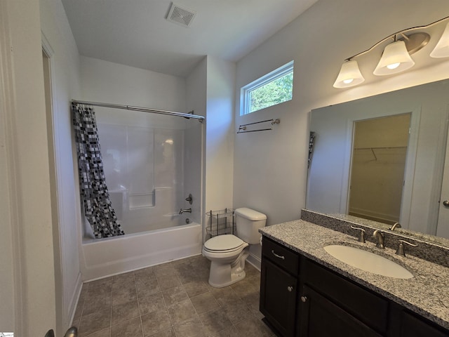 full bathroom with vanity, baseboards, visible vents, shower / bath combo with shower curtain, and toilet