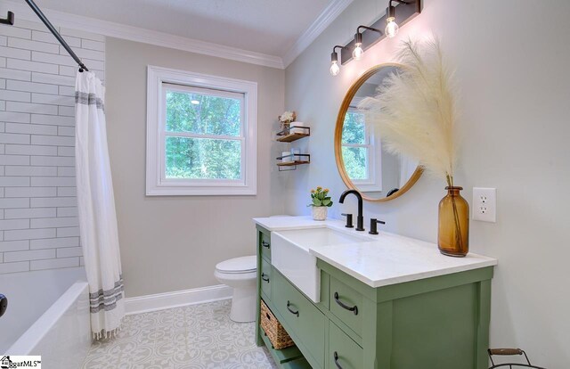 full bathroom with vanity, shower / bath combo, tile patterned flooring, toilet, and ornamental molding