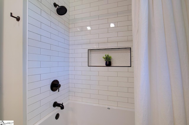 bathroom with shower / tub combo with curtain