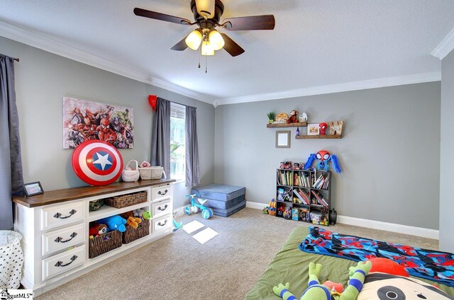 recreation room with ceiling fan, crown molding, and light colored carpet