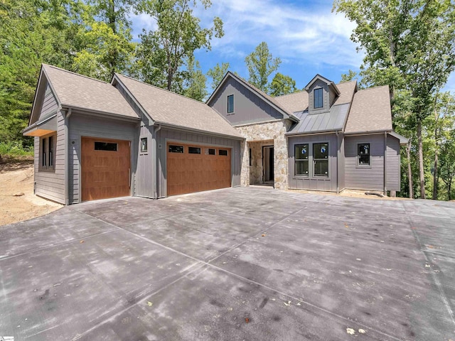 view of front of home with a garage