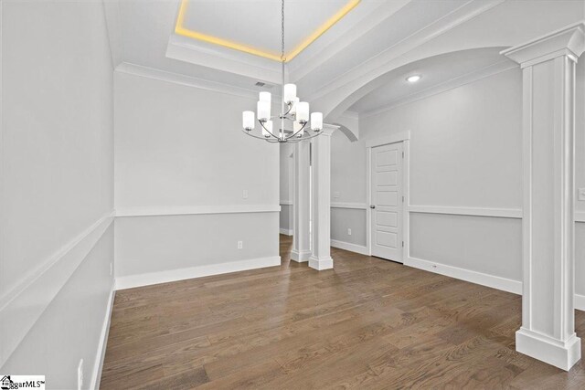 18 Double Crest Dr Lot 5, Taylors, SC 29685 - unfurnished dining area with a chandelier, a raised ceiling, hardwood / wood-style flooring, ornamental molding, and decorative columns