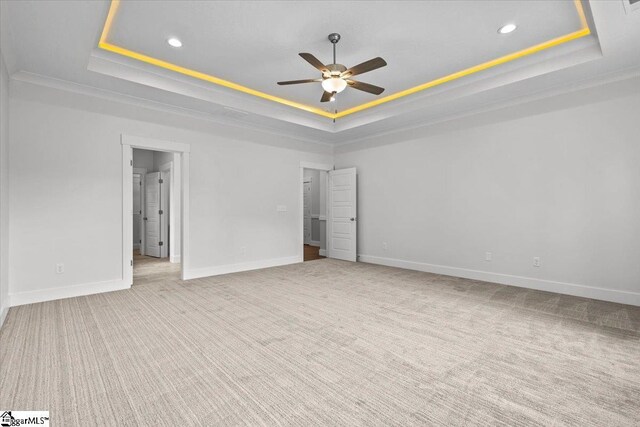 18 Double Crest Dr Lot 5, Taylors, SC 29685 - interior space with ceiling fan, a tray ceiling, and light colored carpet