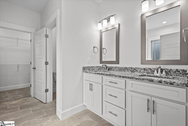 18 Double Crest Dr Lot 5, Taylors, SC 29685 - bathroom featuring double sink vanity and tile patterned floors