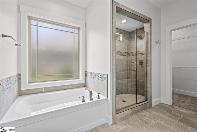 18 Double Crest Dr Lot 5, Taylors, SC 29685 - bathroom with plenty of natural light, tile patterned flooring, and independent shower and bath
