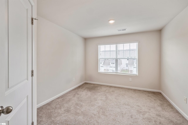 view of carpeted spare room