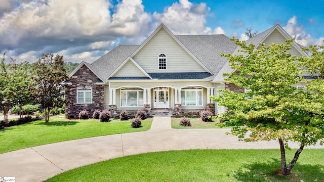 craftsman house with a front yard