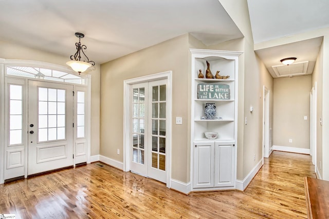 entrance foyer featuring light wood-type flooring