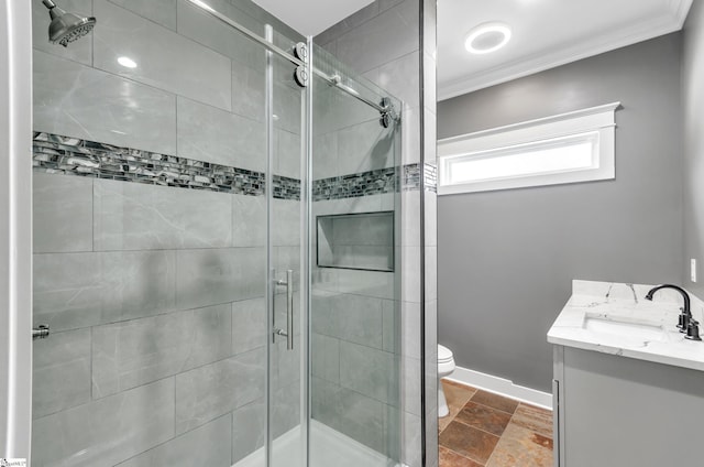 full bath featuring vanity, crown molding, and a shower stall