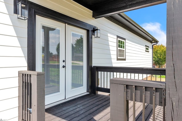 wooden deck featuring french doors