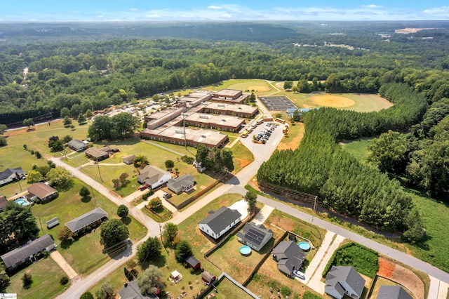 bird's eye view with a forest view