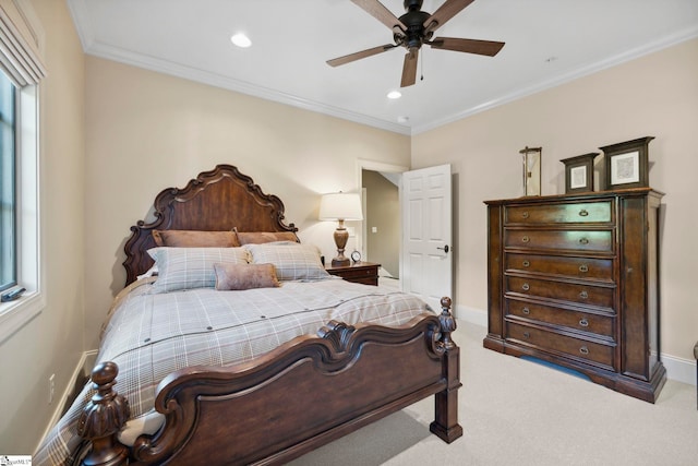 bedroom with ceiling fan, light carpet, and crown molding