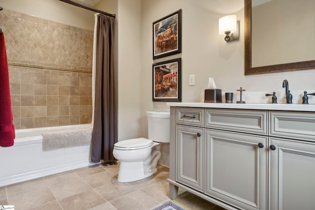 full bathroom with shower / bath combo with shower curtain, vanity, tile patterned floors, and toilet